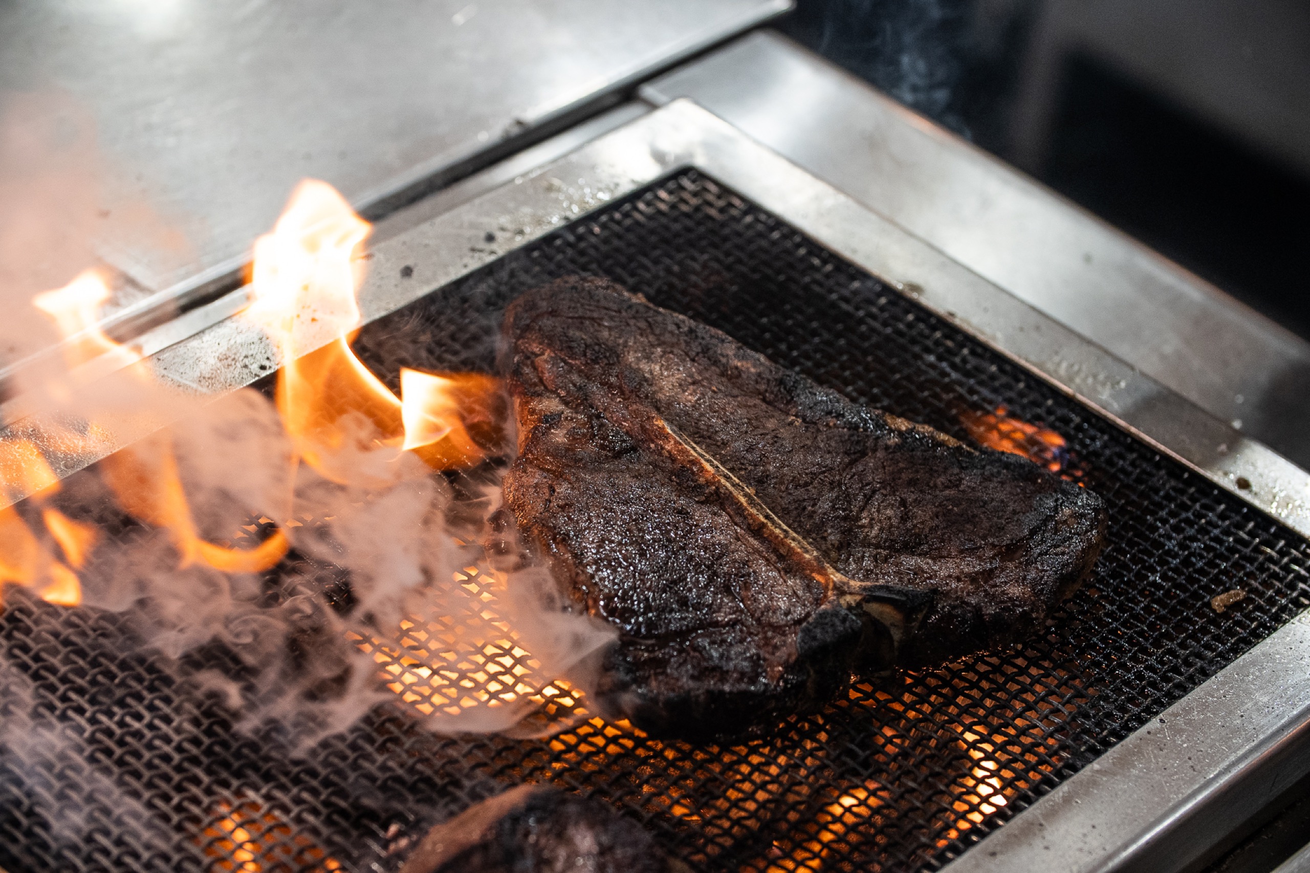Mayura Full-Blood Wagyu flame-searing over live fire